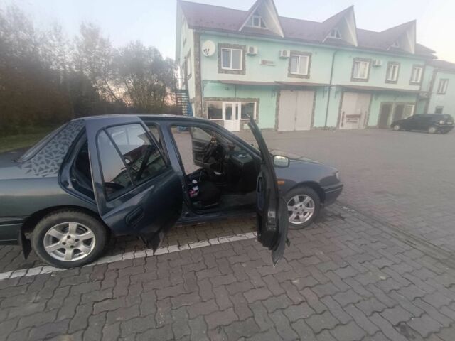 Сірий Ніссан Інша, об'ємом двигуна 1.4 л та пробігом 174 тис. км за 2200 $, фото 5 на Automoto.ua