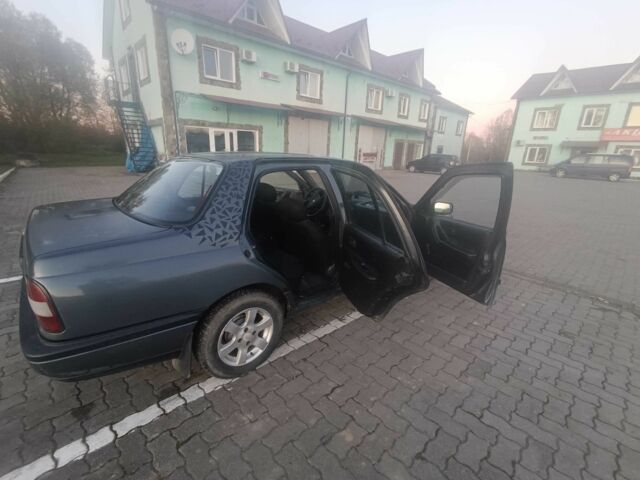 Сірий Ніссан Інша, об'ємом двигуна 1.4 л та пробігом 174 тис. км за 2200 $, фото 2 на Automoto.ua