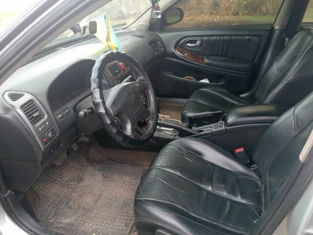 Серый Ниссан Другая, объемом двигателя 3 л и пробегом 390 тыс. км за 1700 $, фото 2 на Automoto.ua