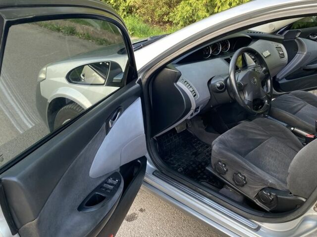 Сірий Ніссан Інша, об'ємом двигуна 2 л та пробігом 318 тис. км за 3700 $, фото 9 на Automoto.ua