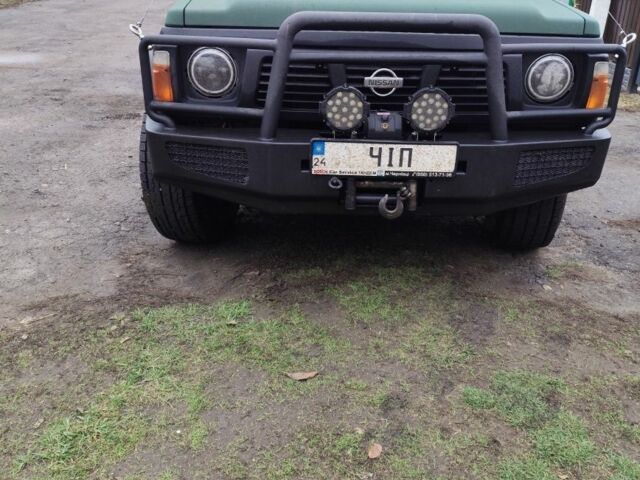 Зеленый Ниссан Другая, объемом двигателя 4 л и пробегом 300 тыс. км за 14500 $, фото 4 на Automoto.ua