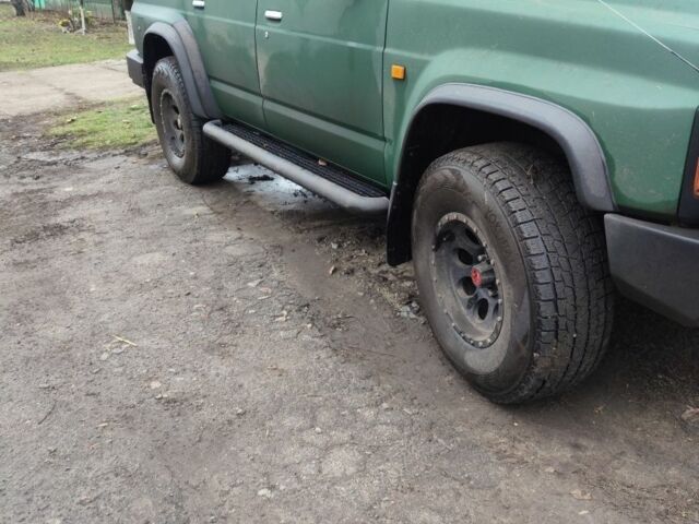 Зеленый Ниссан Другая, объемом двигателя 4 л и пробегом 300 тыс. км за 14500 $, фото 1 на Automoto.ua