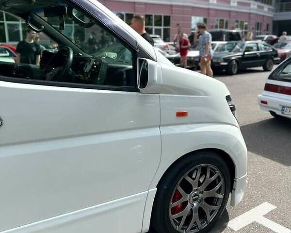 Білий Ніссан Ельгранд, об'ємом двигуна 3.5 л та пробігом 235 тис. км за 10500 $, фото 1 на Automoto.ua