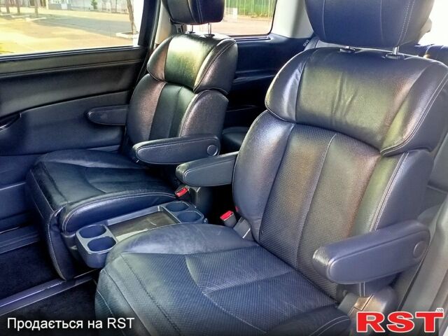 Білий Ніссан Ельгранд, об'ємом двигуна 2.5 л та пробігом 90 тис. км за 16900 $, фото 11 на Automoto.ua