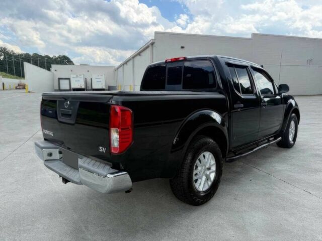 Черный Ниссан Фронтиер, объемом двигателя 4 л и пробегом 50 тыс. км за 25000 $, фото 7 на Automoto.ua