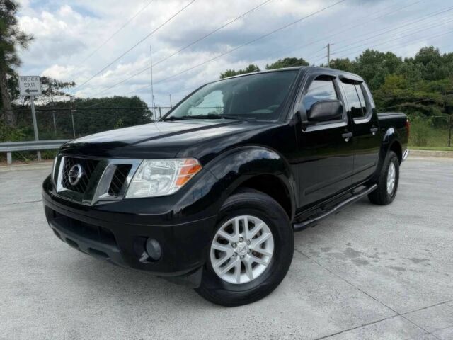 Черный Ниссан Фронтиер, объемом двигателя 4 л и пробегом 50 тыс. км за 25000 $, фото 2 на Automoto.ua