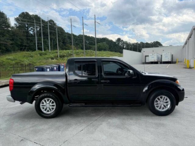 Черный Ниссан Фронтиер, объемом двигателя 4 л и пробегом 50 тыс. км за 25000 $, фото 3 на Automoto.ua