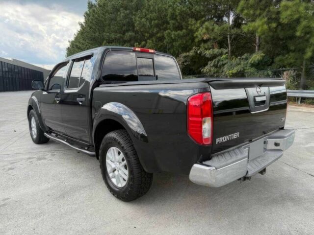 Черный Ниссан Фронтиер, объемом двигателя 4 л и пробегом 50 тыс. км за 25000 $, фото 5 на Automoto.ua