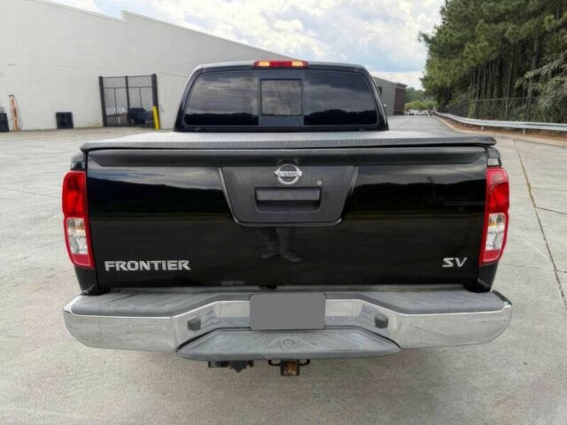 Черный Ниссан Фронтиер, объемом двигателя 4 л и пробегом 50 тыс. км за 25000 $, фото 6 на Automoto.ua