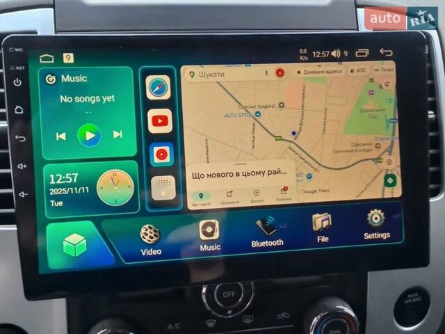 Серый Ниссан Фронтиер, объемом двигателя 4 л и пробегом 200 тыс. км за 15690 $, фото 7 на Automoto.ua