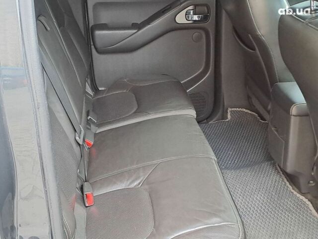 Серый Ниссан Фронтиер, объемом двигателя 4 л и пробегом 200 тыс. км за 15690 $, фото 7 на Automoto.ua