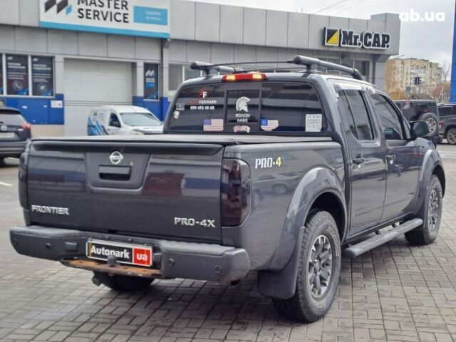 Серый Ниссан Фронтиер, объемом двигателя 4 л и пробегом 200 тыс. км за 15690 $, фото 3 на Automoto.ua