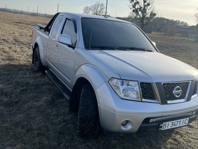 Серый Ниссан Фронтиер, объемом двигателя 4 л и пробегом 117 тыс. км за 19000 $, фото 2 на Automoto.ua