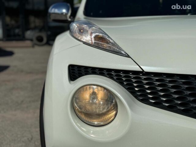 Белый Ниссан Жук, объемом двигателя 1.6 л и пробегом 257 тыс. км за 10590 $, фото 4 на Automoto.ua