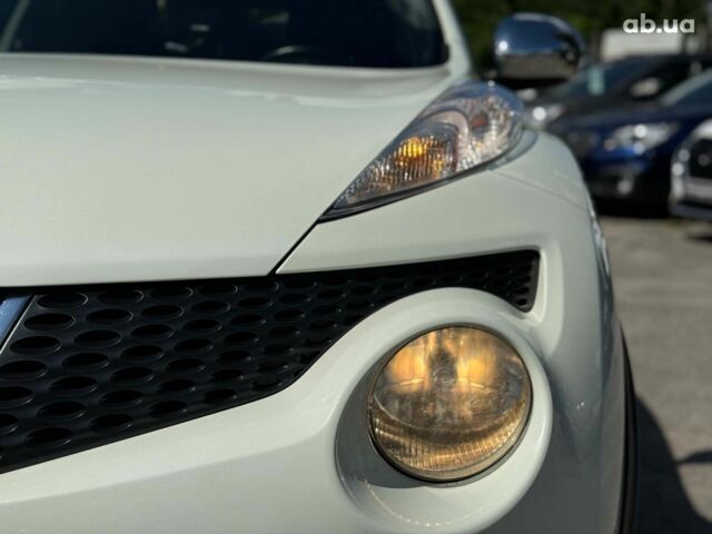 Белый Ниссан Жук, объемом двигателя 1.6 л и пробегом 257 тыс. км за 10590 $, фото 5 на Automoto.ua