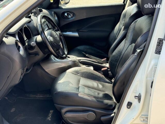 Белый Ниссан Жук, объемом двигателя 1.6 л и пробегом 257 тыс. км за 10590 $, фото 18 на Automoto.ua