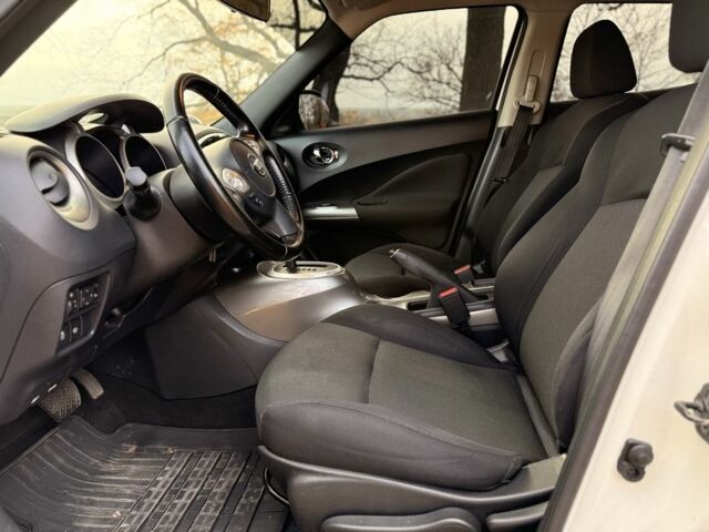 Белый Ниссан Жук, объемом двигателя 1.6 л и пробегом 95 тыс. км за 259 $, фото 7 на Automoto.ua