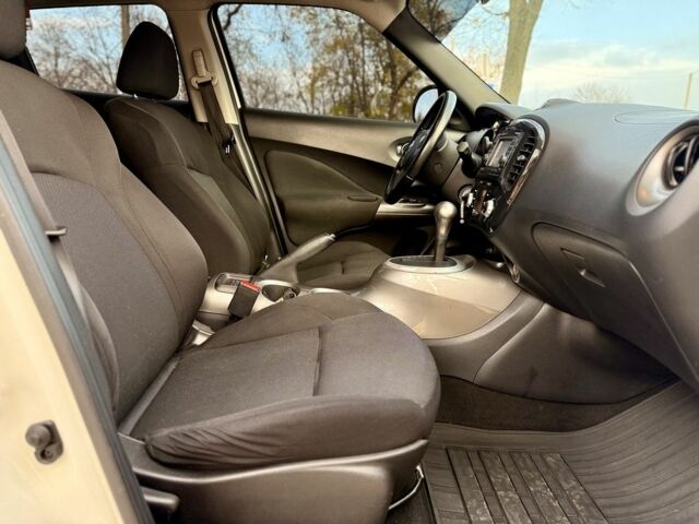 Белый Ниссан Жук, объемом двигателя 1.6 л и пробегом 95 тыс. км за 259 $, фото 3 на Automoto.ua