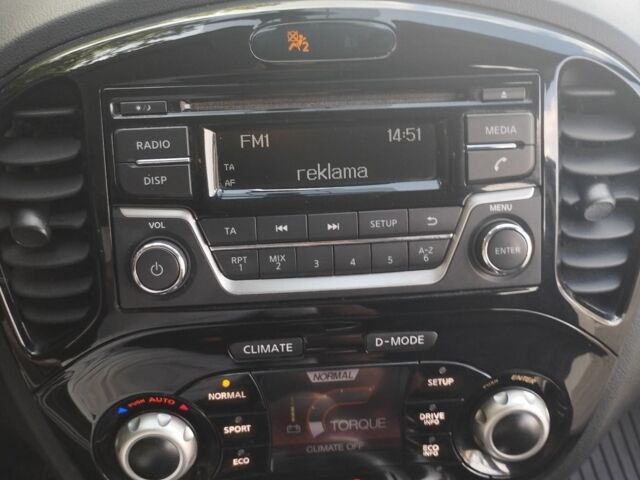 Белый Ниссан Жук, объемом двигателя 1.6 л и пробегом 40 тыс. км за 11500 $, фото 5 на Automoto.ua