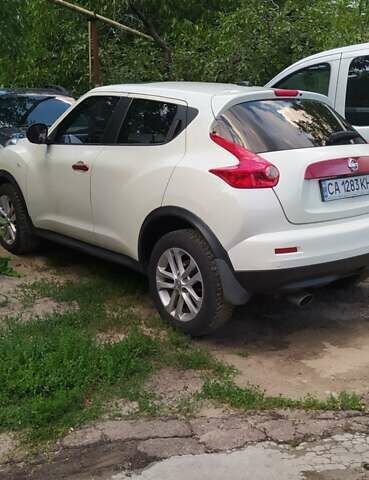 Белый Ниссан Жук, объемом двигателя 1.6 л и пробегом 299 тыс. км за 8700 $, фото 10 на Automoto.ua