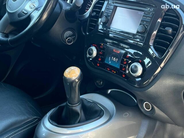 Белый Ниссан Жук, объемом двигателя 1.6 л и пробегом 204 тыс. км за 7990 $, фото 15 на Automoto.ua