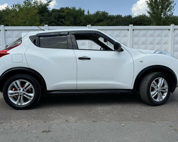 Белый Ниссан Жук, объемом двигателя 1.46 л и пробегом 189 тыс. км за 9000 $, фото 4 на Automoto.ua