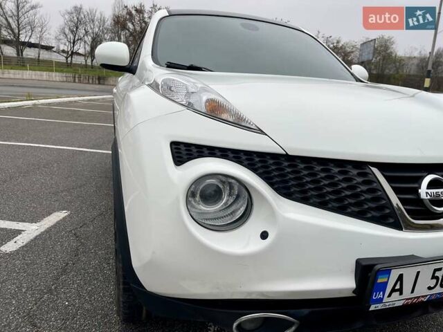 Белый Ниссан Жук, объемом двигателя 1.6 л и пробегом 165 тыс. км за 9500 $, фото 7 на Automoto.ua