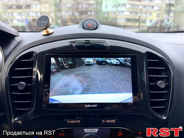 Белый Ниссан Жук, объемом двигателя 1.6 л и пробегом 145 тыс. км за 9700 $, фото 13 на Automoto.ua