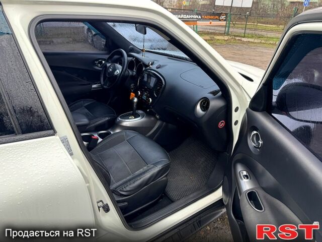 Белый Ниссан Жук, объемом двигателя 1.6 л и пробегом 145 тыс. км за 9700 $, фото 9 на Automoto.ua