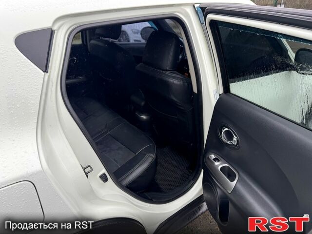 Белый Ниссан Жук, объемом двигателя 1.6 л и пробегом 145 тыс. км за 9700 $, фото 11 на Automoto.ua