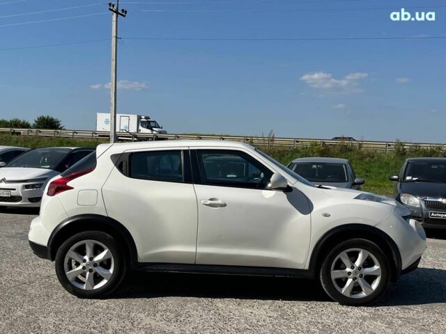 Белый Ниссан Жук, объемом двигателя 1.6 л и пробегом 204 тыс. км за 7990 $, фото 5 на Automoto.ua