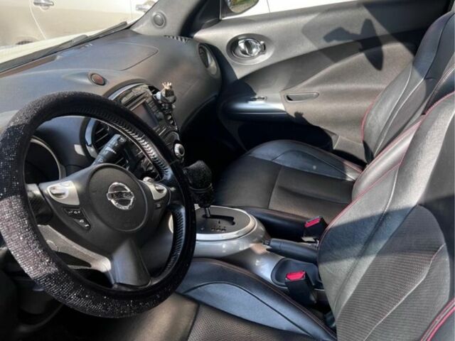 Белый Ниссан Жук, объемом двигателя 1.6 л и пробегом 201 тыс. км за 8700 $, фото 6 на Automoto.ua