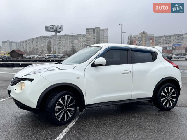 Белый Ниссан Жук, объемом двигателя 1.6 л и пробегом 148 тыс. км за 9800 $, фото 6 на Automoto.ua