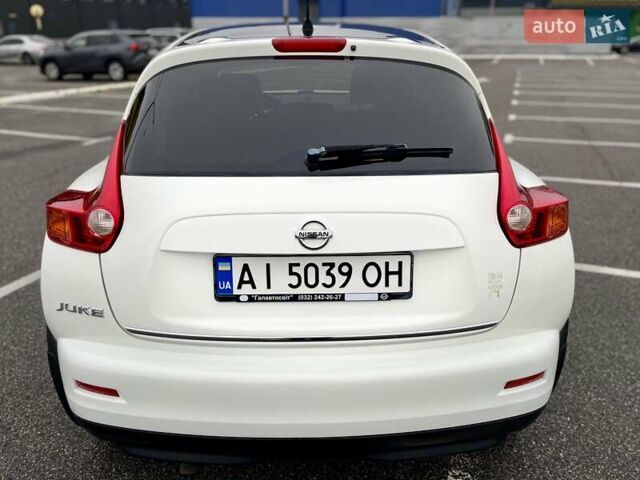 Белый Ниссан Жук, объемом двигателя 1.6 л и пробегом 165 тыс. км за 9500 $, фото 5 на Automoto.ua