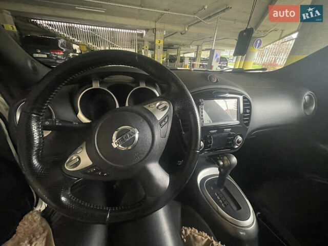 Белый Ниссан Жук, объемом двигателя 1.6 л и пробегом 151 тыс. км за 9450 $, фото 18 на Automoto.ua