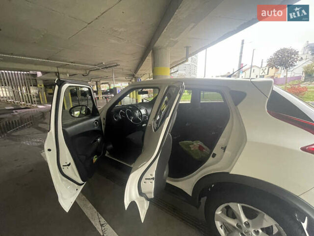 Белый Ниссан Жук, объемом двигателя 1.6 л и пробегом 151 тыс. км за 9450 $, фото 7 на Automoto.ua