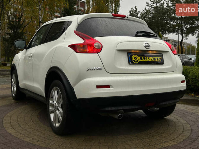 Белый Ниссан Жук, объемом двигателя 1.6 л и пробегом 165 тыс. км за 8999 $, фото 4 на Automoto.ua