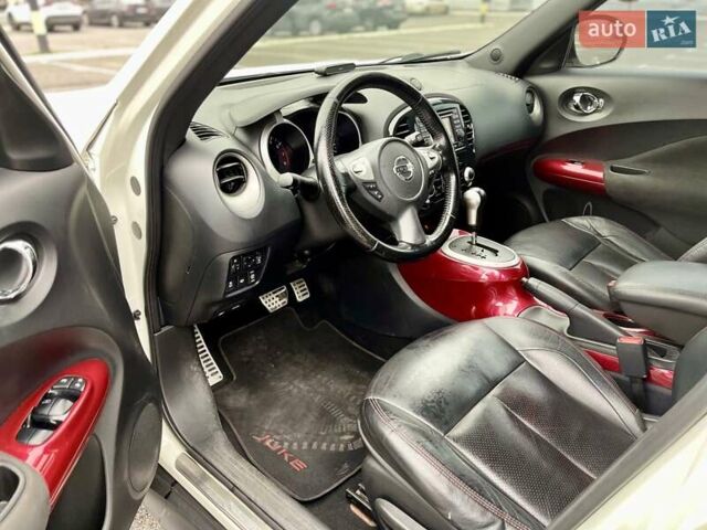 Белый Ниссан Жук, объемом двигателя 1.6 л и пробегом 165 тыс. км за 9500 $, фото 10 на Automoto.ua