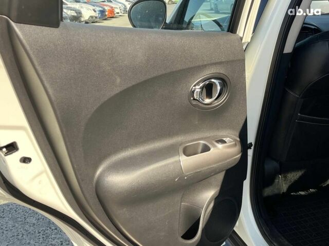 Белый Ниссан Жук, объемом двигателя 1.6 л и пробегом 204 тыс. км за 7990 $, фото 28 на Automoto.ua