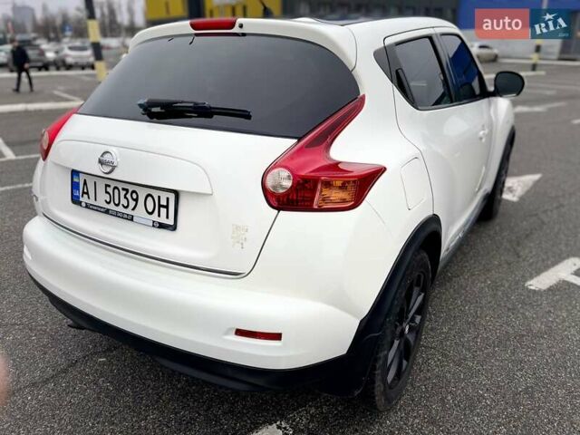 Белый Ниссан Жук, объемом двигателя 1.6 л и пробегом 165 тыс. км за 9500 $, фото 6 на Automoto.ua