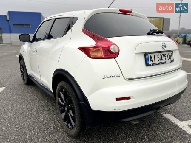 Белый Ниссан Жук, объемом двигателя 1.6 л и пробегом 165 тыс. км за 9500 $, фото 4 на Automoto.ua