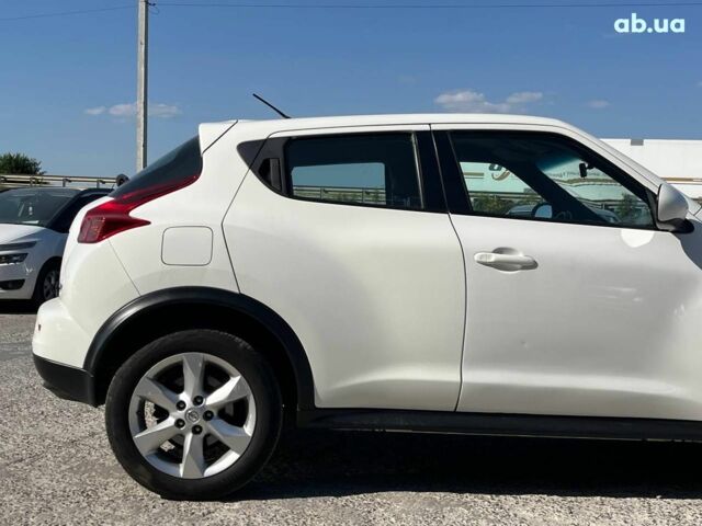 Белый Ниссан Жук, объемом двигателя 1.6 л и пробегом 204 тыс. км за 7990 $, фото 6 на Automoto.ua