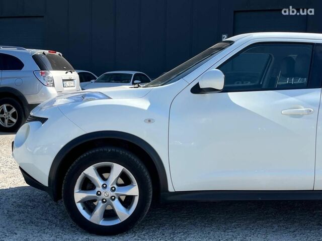 Белый Ниссан Жук, объемом двигателя 1.6 л и пробегом 204 тыс. км за 7990 $, фото 12 на Automoto.ua