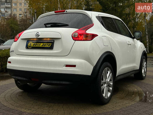 Белый Ниссан Жук, объемом двигателя 1.6 л и пробегом 165 тыс. км за 8999 $, фото 6 на Automoto.ua