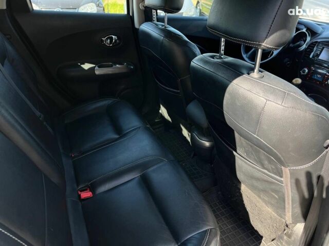 Белый Ниссан Жук, объемом двигателя 1.6 л и пробегом 204 тыс. км за 7990 $, фото 20 на Automoto.ua