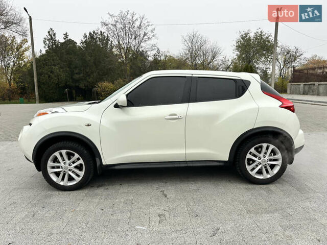 Белый Ниссан Жук, объемом двигателя 1.6 л и пробегом 265 тыс. км за 8900 $, фото 4 на Automoto.ua