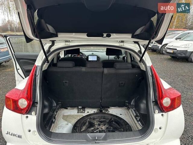 Белый Ниссан Жук, объемом двигателя 1.6 л и пробегом 157 тыс. км за 9300 $, фото 12 на Automoto.ua