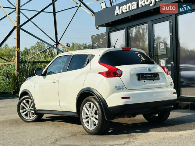 Белый Ниссан Жук, объемом двигателя 1.6 л и пробегом 133 тыс. км за 10800 $, фото 3 на Automoto.ua