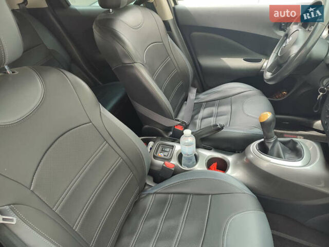 Белый Ниссан Жук, объемом двигателя 1.6 л и пробегом 155 тыс. км за 10200 $, фото 4 на Automoto.ua