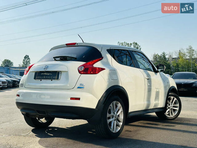 Белый Ниссан Жук, объемом двигателя 1.6 л и пробегом 133 тыс. км за 10800 $, фото 1 на Automoto.ua